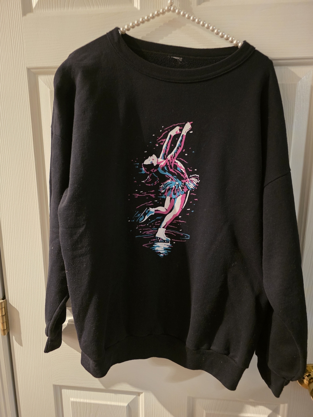 Black Crewneck Sweatshirt with Neon Figure Skate Graphic